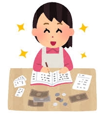 笑顔で家計簿を付けている主婦
